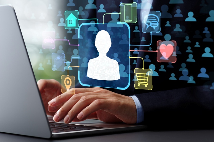 customer profile icon and typing on laptop in background