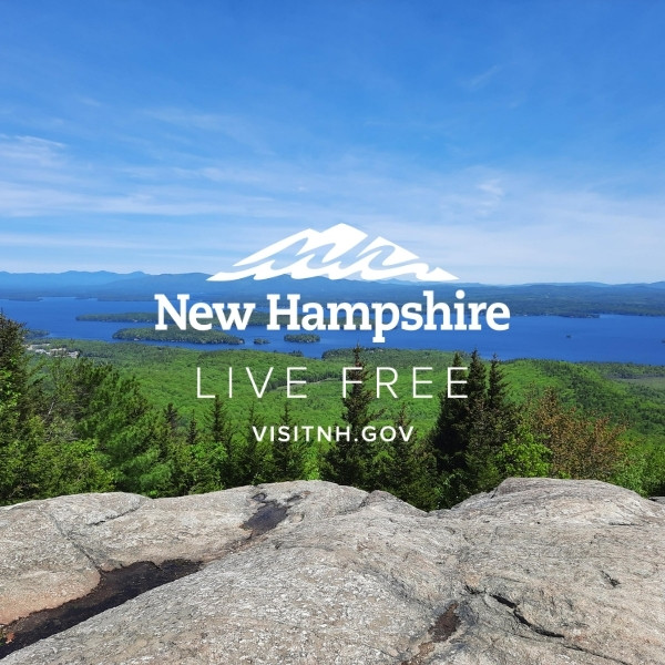 New hampshire lake landscape with VisitNH.gov logo overlayed